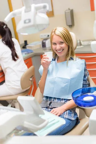 woman about to take a sedative prior to her oral surgery procedure