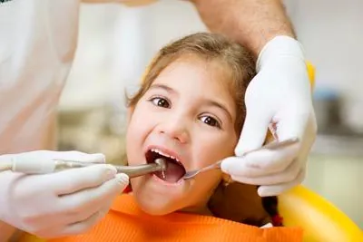 young girl getting her teeth cleaned at Smile Studio Dentistry in Upland, CA