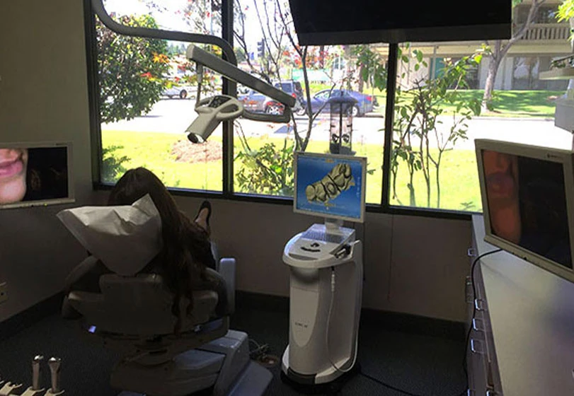 a dental exam chair inside of Smile Studio Dentistry in Upland, CA