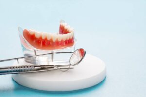 featured image for dentures versus dental bridges
